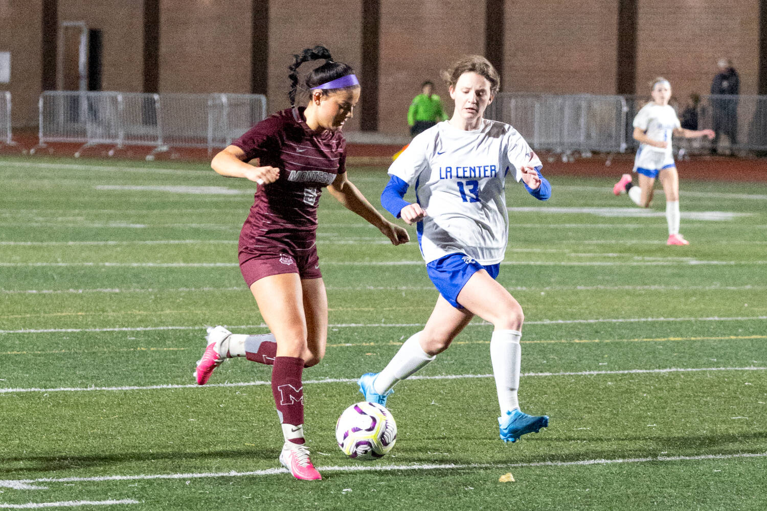 PHOTO BY SHAWN DONNELLY Montesano senior Adda Potts (left) scores a goal in the first half of the Bulldogs’ 4-1 district-tournament victory over La Center on Tuesday in Montesano.