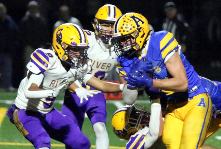 <p>RYAN SPARKS | THE DAILY WORLD Aberdeen running back Micah Schroeder (right) carries the ball against Columbia River defensive back Aedan Pena during the Bobcats’ 7-6 loss in a 2A State play-in matchup on Tuesday at Stewart Field in Aberdeen.</p>