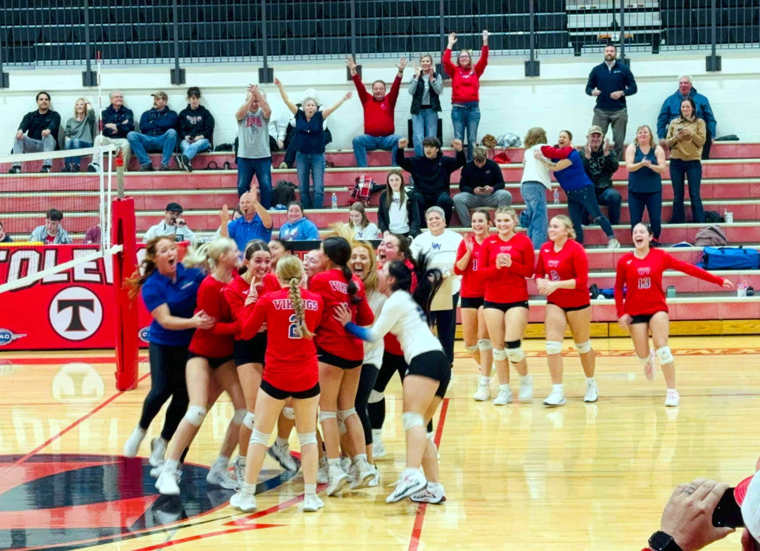 PHOTO BY TIA CHANNELL The Willapa Valley Vikings celebrate a berth to the state tournament after a 3-2 victory over Ocosta in a 1B District 4 Tournament semifinal game on Thursday at Toledo High School.