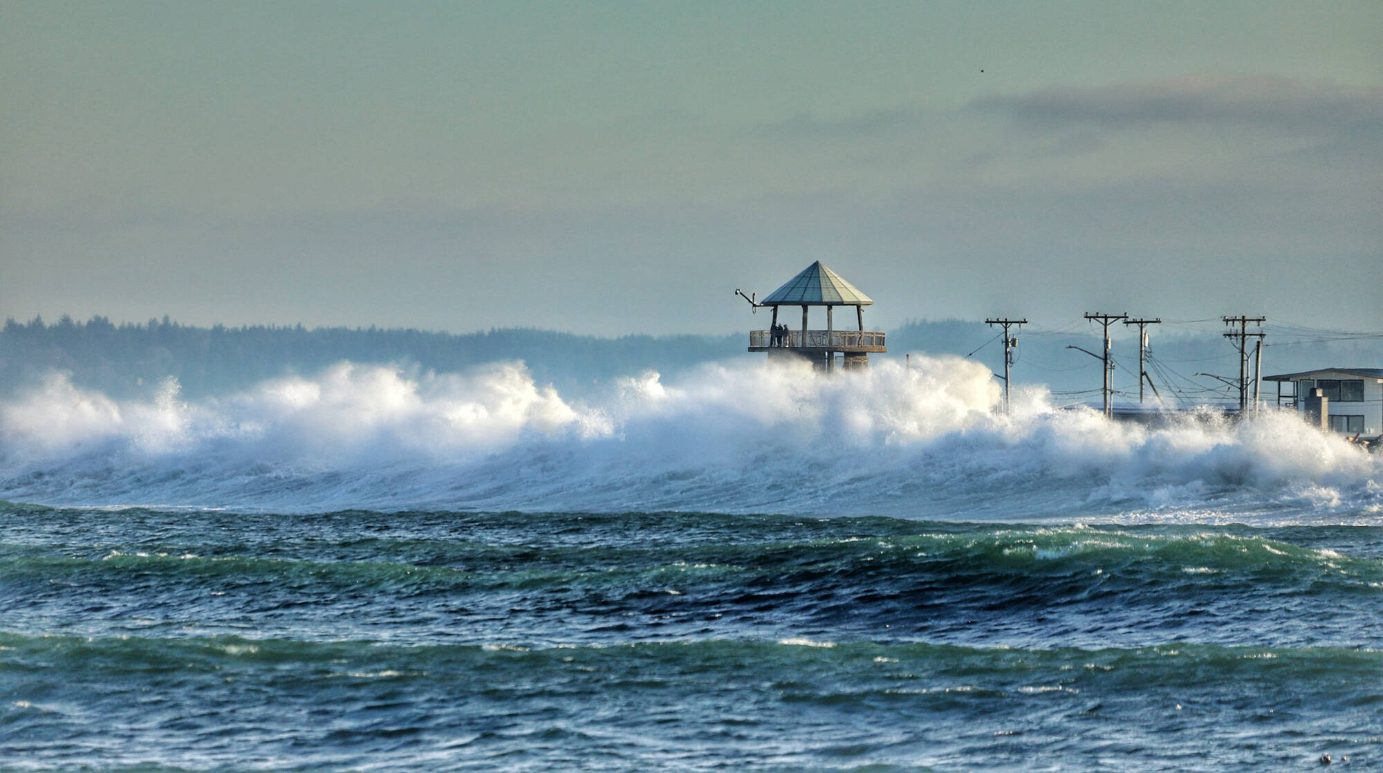 mycoast.org / Stefanie Baltzell
A king tide washes over the watch tower in Westport on Nov. 25 last year, about a half hour before high tide.