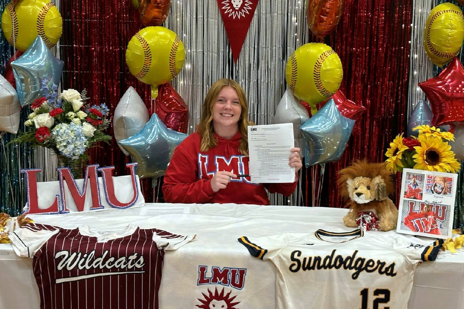 PHOTO BY BARBARA RASMUS Ocosta senior all-state softball pitcher Jessie Gilbert signed a National Letter of Intent to attend for Loyola Marymount University next fall. A two-time 2B Pacific League MVP, Gilbert led the Wildcats to a district-championship two seasons ago and holds the state record for strikeouts in a game with 22.