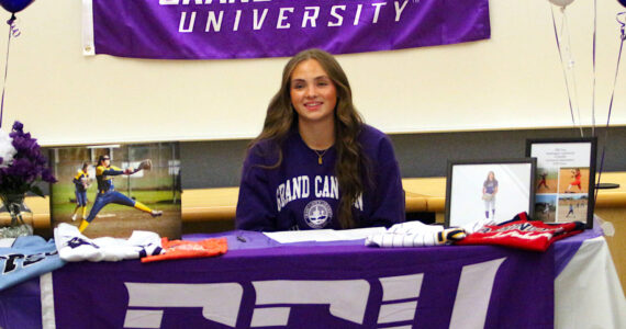 RYAN SPARKS | THE DAILY WORLD Aberdeen senior softball pitcher Lilly Camp made it official by signing a National Letter of Intent to play for Grand Canyon University after graduation. Family, friends, coaches and teammates attended a signing ceremony for Camp on Tuesday at Aberdeen High School. Camp, who verbally committed to the Phoenix, Arizona school last spring, had led Aberdeen to two-straight appearances in the 2A State Tournament and is considered one of the top pitchers in the class heading into the 2025 season. In a speech at the ceremony, Camp reflected on her softball journey and thanked her parents and the many coaches that helped her along the way. “Since I was little, I never knew that this was where I would end up. I have always dreamed of playing college softball and going DI. I am so excited this is where I ended up,” she said. “Through the people who didn’t believe in me and through the people that did, I am so happy and excited to say that I am continuing my career. … Thank you to all of my friends and family for supporting me as well and not telling me whether I should do this or I should do that. Everyone’s support means the world to me, so thank you, everyone.”