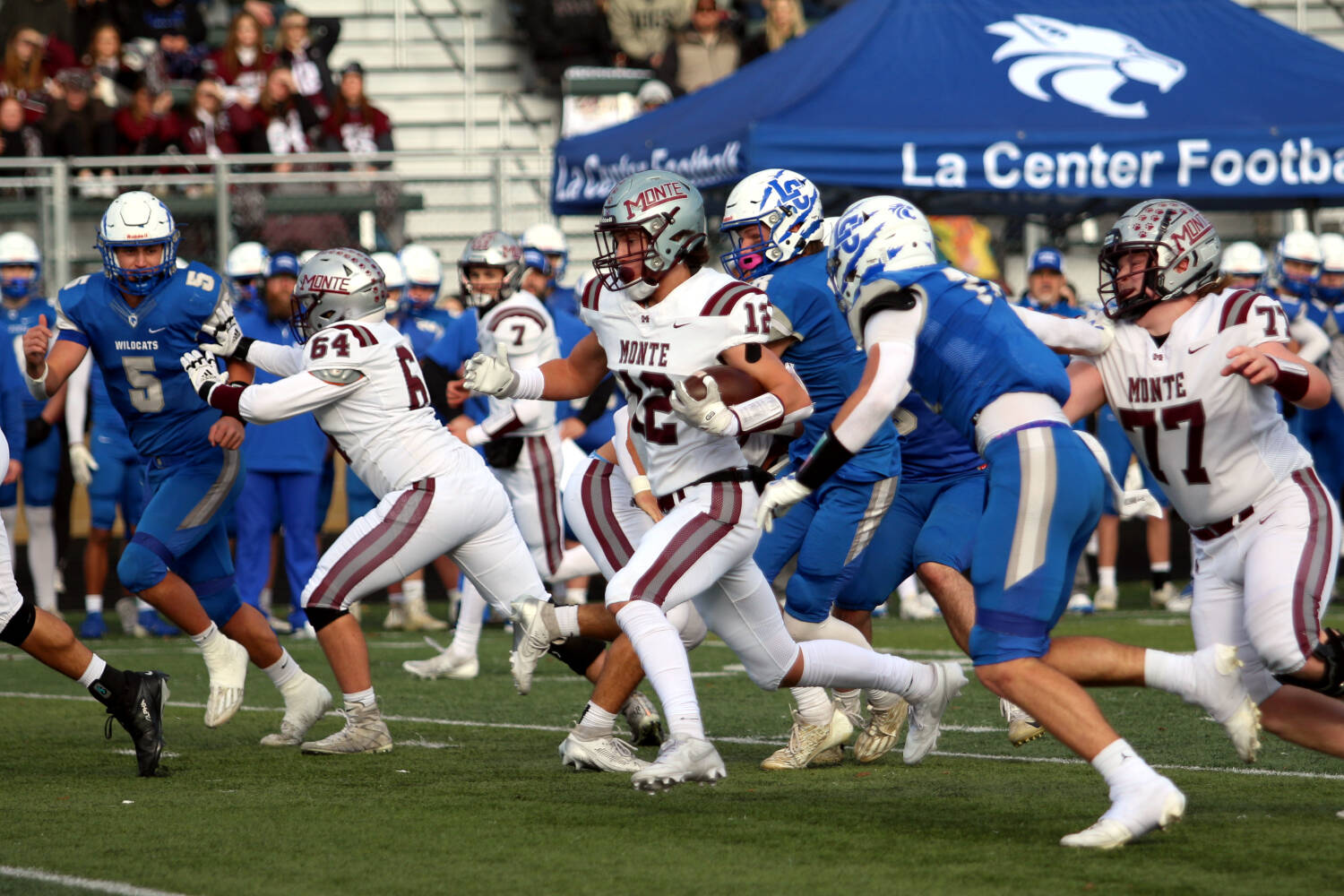 RYAN SPARKS | THE DAILY WORLD Montesano’s Toren Crites (12) runs through the La Center defense during a 21-10 win in a 1A State Football quarterfinal game on Saturday at Woodland High School.