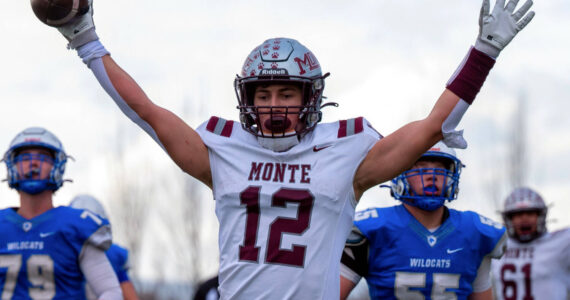 PHOTO BY FOREST WORGUM Montesano’s Toren Crites raises his arms after scoring a touchdown during a 21-10 win over La Center in a 1A State Football quarterfinal game on Saturday at Woodland High School.