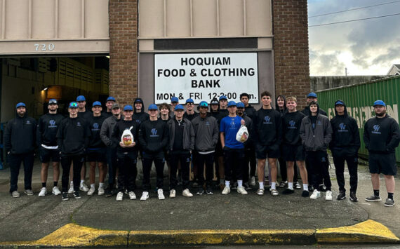 PHOTO COURTESY OF GRAYS HARBOR COLLEGE The Grays Harbor College baseball team poses for a photo after donating turkeys to the Hoquiam Food & Clothing Bank.