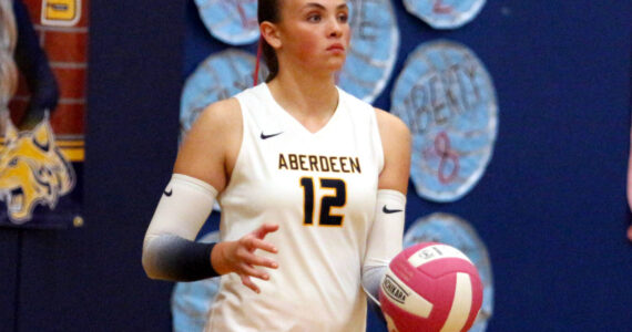 DAILY WORLD FILE PHOTO Aberdeen senior middle blocker Lilly Camp