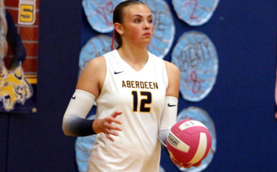 DAILY WORLD FILE PHOTO Aberdeen senior middle blocker Lilly Camp