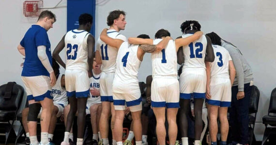 PHOTO COURTESY OF GRAYS HARBOR COLLEGE The Grays Harbor Chokers huddle up during a game against Wenatchee Valley on Sunday in Aberdeen.