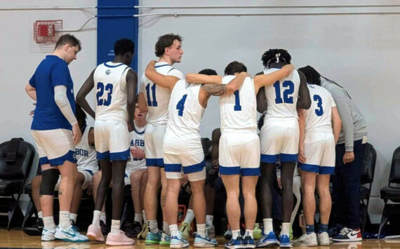 PHOTO COURTESY OF GRAYS HARBOR COLLEGE The Grays Harbor Chokers huddle up during a game against Wenatchee Valley on Sunday in Aberdeen.