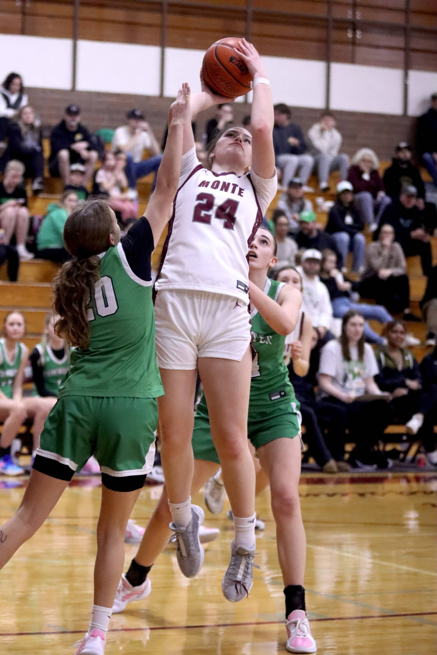 PHOTO BY HAILEY BLANCAS Montesano’s Jillie Dalan scores two of her team-high 23 points during a 57-46 victory over Tumwater on Thursday at Montesano High School.