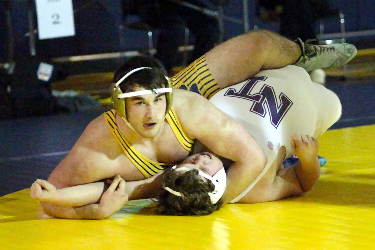 RYAN SPARKS | THE DAILY WORLD Aberdeen’s Landon Hamblin (top) works toward a pinfall win over North Thurston’s Konner Jack during the 285-pound final at the Grays Harbor Championships on Saturday at Aberdeen High School.