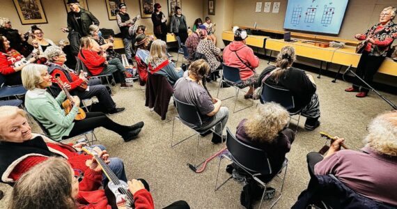 Barbara A. Smith photos / For The Daily World
It was standing room only at Aberdeen’s World Music Day Ukulele showcase on Saturday at the Aberdeen Library, as Mary Lou Gregory offers ukulele playing lessons.