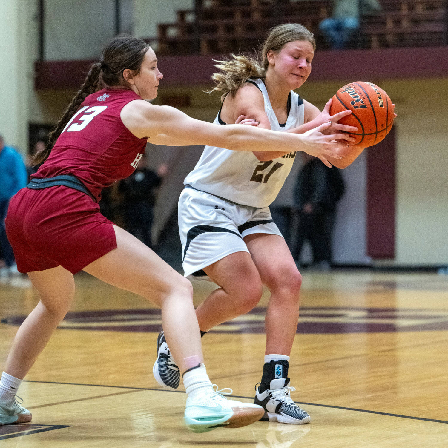 PHOTO BY FOREST WORGUM Raymond-South Bend’s Kassie Koski (right) is defended by Hoquiam’s Katlyn Brodhead during the Ravens’ 48-41 win in the Raymond New Year’s Tournament on Saturday in South Bend.