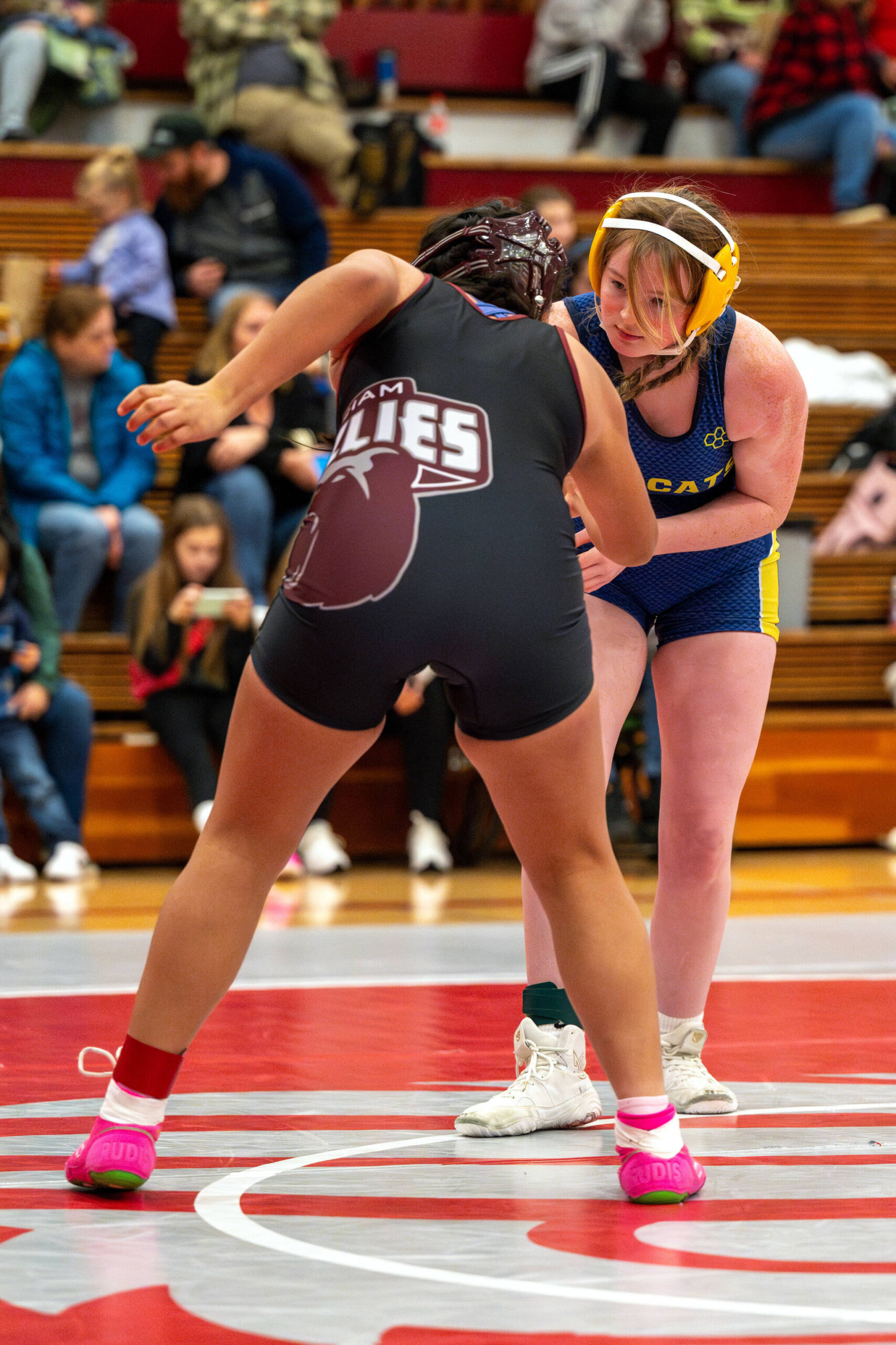 PHOTO BY FOREST WORGUM Aberdeen’s Halo Wilson (right) wrestles with Hoquiam’s Brittany Alcala during a 155-pound quarterfinal match at the Grizzly Stocking Stuffer wrestling tournament on Saturday at Hoquiam High School.