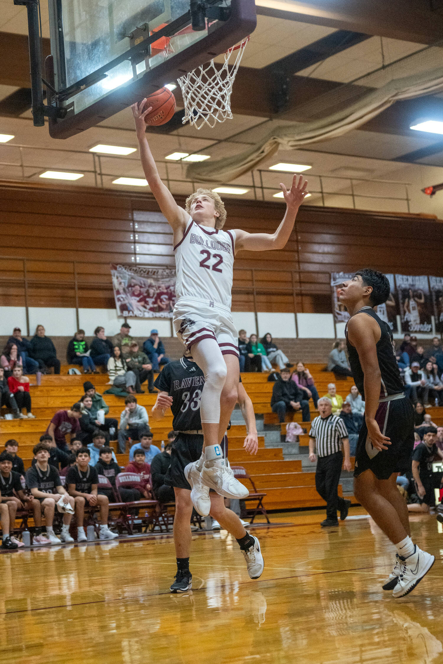 PHOTO BY FOREST WORGUM Montesano’s Mason Fry (22) glides to the basket to score two of his game-high 17 points in a 57-40 win over Raymond-South Bend on Monday at Montesano High School.