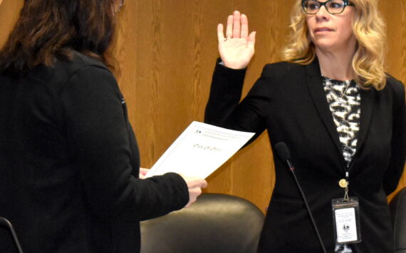 Jerry Knaak photos / The Daily World
New Grays Harbor County District 1 Commissioner Georgia Miller takes the oath of office.