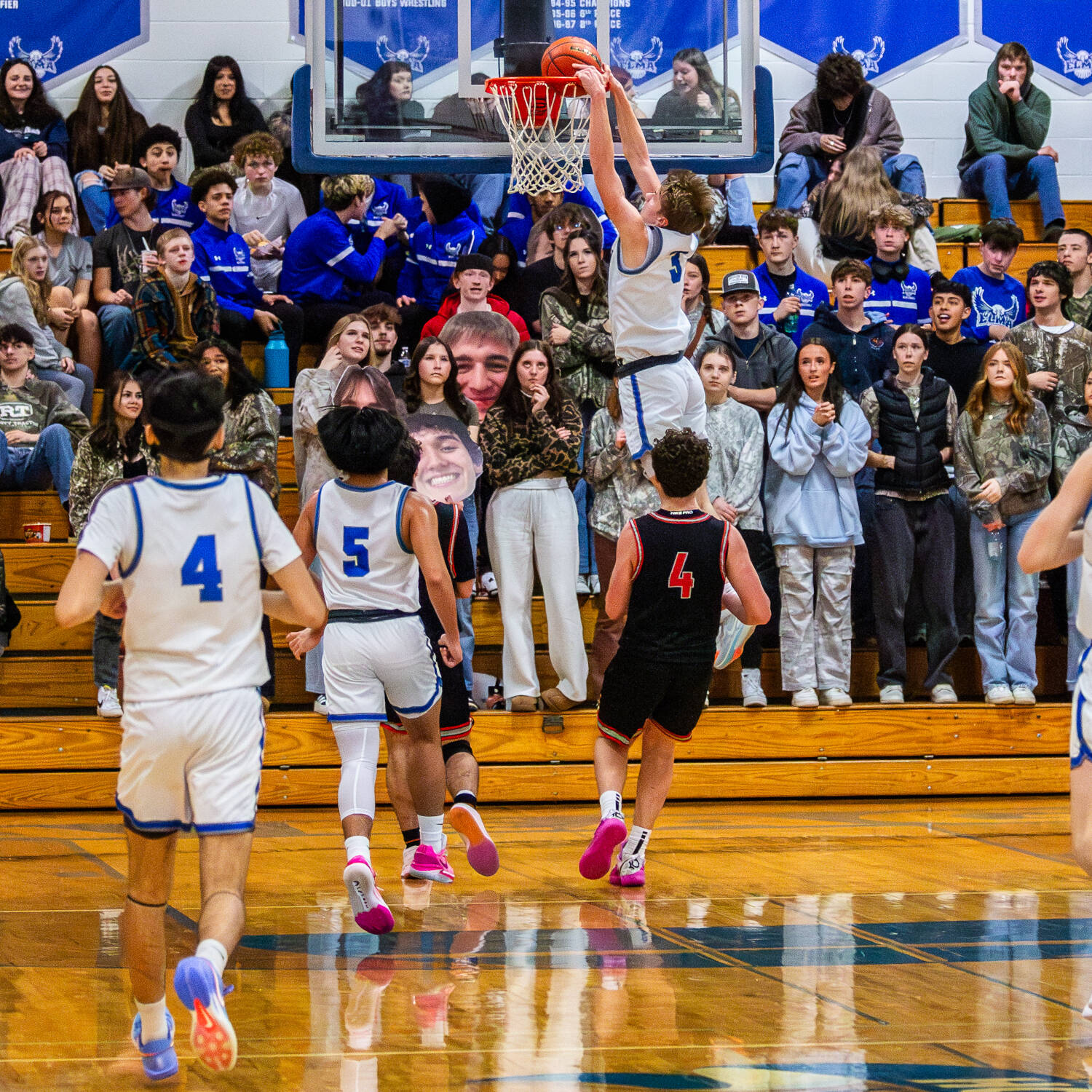 PHOTO BY MIKE ROBERTS Elma’s Isaac McGaffey rises for a dunk during a 56-49 loss to Tenino on Wednesday in Elma.