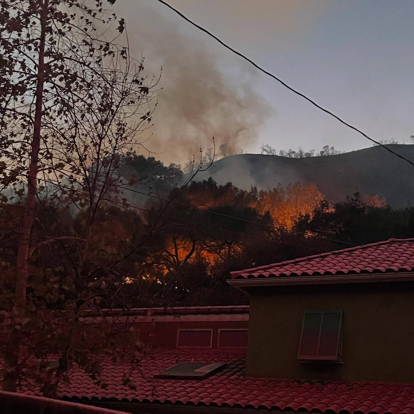 Hillsides burn in California in this photograph sent back from Hoquiam firefighters on Sunday.