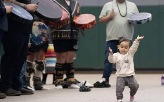 Photos by Amiran White
A youngster gets into the rhythm and spirit of the occasion at the Winter Gathering of the Chinook Indian Nation. The Bay Center-based tribe conducts some major events in Clatsop County, part of their hereditary territory.