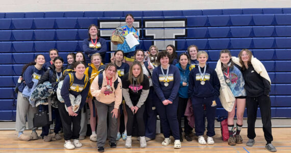 PHOTO COURTESY OF ABERDEEN BOBCAT BOOSTER CLUB The Aberdeen Bobcats post for a photo after winning the team title at the Mascara Madness tournament on Saturday in Belfair.