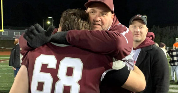 SUBMITTED PHOTO Longtime Montesano youth sports coach Steve Bove, seen here consoling Montesano’s Kyle Caton in 2022, has been recently diagnosed with cancer and hospitalized. A fundraiser has been set up to help with medical expenses.