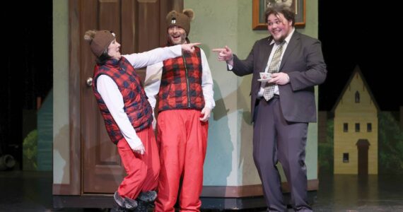 Keith Krueger photos / The Daily World
Pictured, from left, are Cindy Lu Strode, JR Lakey and Aiden Brown. Phil Connors (Brown) makes acquaintances with Punxsutawney citizens Mr. and Mrs. Cleveland.