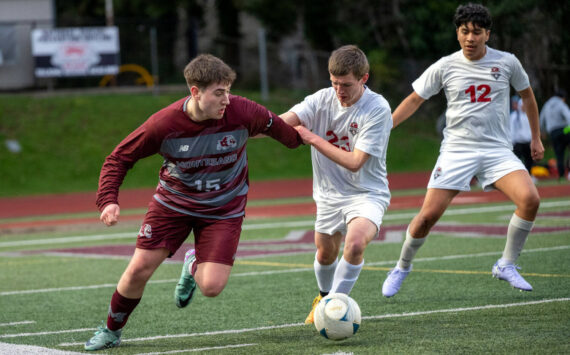 RYAN SPARKS | THE DAILY WORLD Montesano’s Felix Romero (left) dribbles the ball during a scrimmage against the Hoquiam Grizzlies during the Montesano Boys Soccer Jamboree on Monday at Montesano High School.